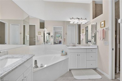 ELEVATE YOURSELF into this lovely second-floor coach home in on Pelican Marsh Golf Club in Florida - for sale on GolfHomes.com, golf home, golf lot