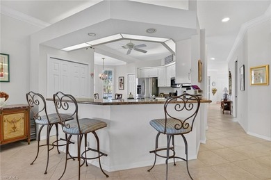 ELEVATE YOURSELF into this lovely second-floor coach home in on Pelican Marsh Golf Club in Florida - for sale on GolfHomes.com, golf home, golf lot