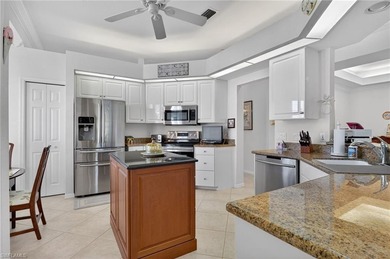 ELEVATE YOURSELF into this lovely second-floor coach home in on Pelican Marsh Golf Club in Florida - for sale on GolfHomes.com, golf home, golf lot