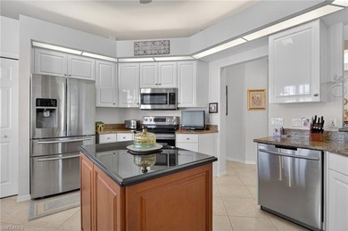 ELEVATE YOURSELF into this lovely second-floor coach home in on Pelican Marsh Golf Club in Florida - for sale on GolfHomes.com, golf home, golf lot