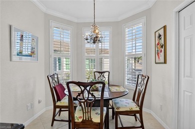 ELEVATE YOURSELF into this lovely second-floor coach home in on Pelican Marsh Golf Club in Florida - for sale on GolfHomes.com, golf home, golf lot