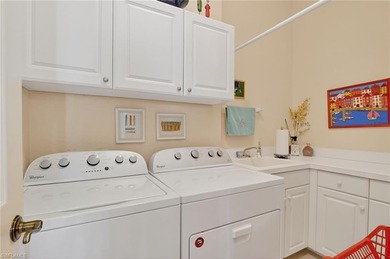 ELEVATE YOURSELF into this lovely second-floor coach home in on Pelican Marsh Golf Club in Florida - for sale on GolfHomes.com, golf home, golf lot