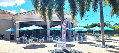 ELEVATE YOURSELF into this lovely second-floor coach home in on Pelican Marsh Golf Club in Florida - for sale on GolfHomes.com, golf home, golf lot