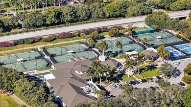 ELEVATE YOURSELF into this lovely second-floor coach home in on Pelican Marsh Golf Club in Florida - for sale on GolfHomes.com, golf home, golf lot