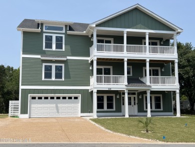 Newly built luxury home located in the prestigious community of on The Currituck Golf Club in North Carolina - for sale on GolfHomes.com, golf home, golf lot