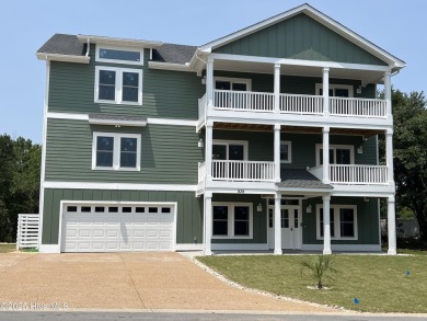 Newly built luxury home located in the prestigious community of on The Currituck Golf Club in North Carolina - for sale on GolfHomes.com, golf home, golf lot