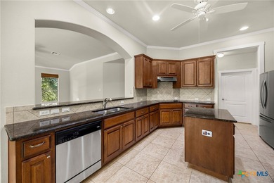 Nestled on a corner lot and along the 17th fairway of the on Apple Rock Golf Course - Horseshoe Bay in Texas - for sale on GolfHomes.com, golf home, golf lot