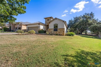Nestled on a corner lot and along the 17th fairway of the on Apple Rock Golf Course - Horseshoe Bay in Texas - for sale on GolfHomes.com, golf home, golf lot