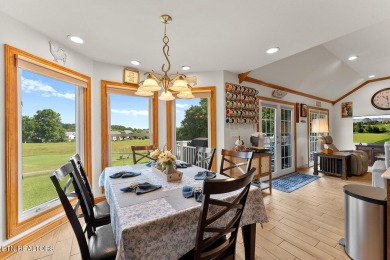 Welcome to 407 Kahite Trail, a stunning golf-front home, located on Tellico Village -The Links At Kahite Golf Course in Tennessee - for sale on GolfHomes.com, golf home, golf lot