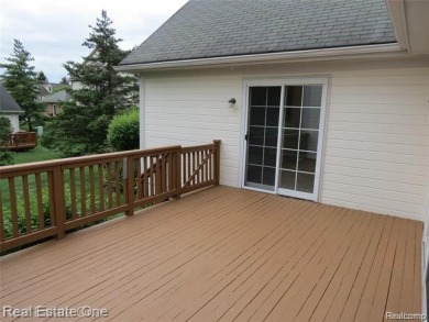 Welcome to this beautiful end unit condo in Country Club Village on Bushwood Golf Club in Michigan - for sale on GolfHomes.com, golf home, golf lot
