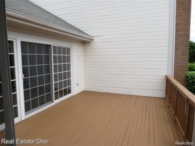 Welcome to this beautiful end unit condo in Country Club Village on Bushwood Golf Club in Michigan - for sale on GolfHomes.com, golf home, golf lot
