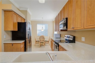 STUNNING 2 BEDROOM + DEN, TURNKEY -End Unit Condo with GOLF on Heritage Bay Golf Course in Florida - for sale on GolfHomes.com, golf home, golf lot