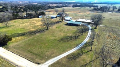 Discover the charm of country living with the convenience of on Coopers Hawk in Arkansas - for sale on GolfHomes.com, golf home, golf lot