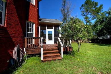 This lovely two-story brick home is located in The Highlands on on Highland Oaks Golf Course in Alabama - for sale on GolfHomes.com, golf home, golf lot