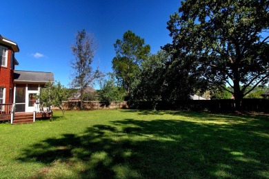 This lovely two-story brick home is located in The Highlands on on Highland Oaks Golf Course in Alabama - for sale on GolfHomes.com, golf home, golf lot