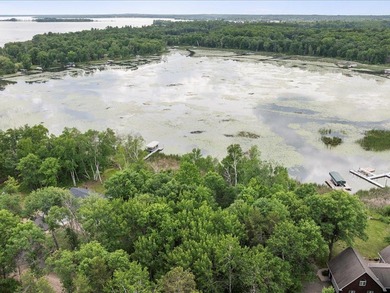 Discover your lakeside paradise with this 100-foot level lot on on Deacons Lodge Golf Course in Minnesota - for sale on GolfHomes.com, golf home, golf lot