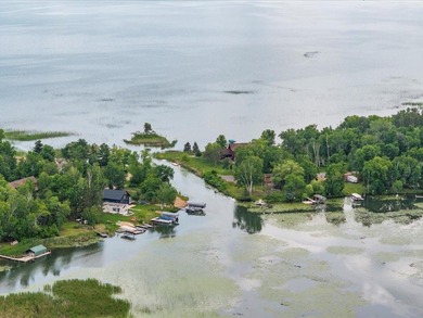 Discover your lakeside paradise with this 100-foot level lot on on Deacons Lodge Golf Course in Minnesota - for sale on GolfHomes.com, golf home, golf lot