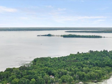Discover your lakeside paradise with this 100-foot level lot on on Deacons Lodge Golf Course in Minnesota - for sale on GolfHomes.com, golf home, golf lot