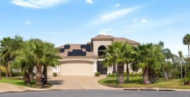 Experience luxury living with this exquisite 4-bedroom, 2.5-bath on South Padre Island Golf Club in Texas - for sale on GolfHomes.com, golf home, golf lot