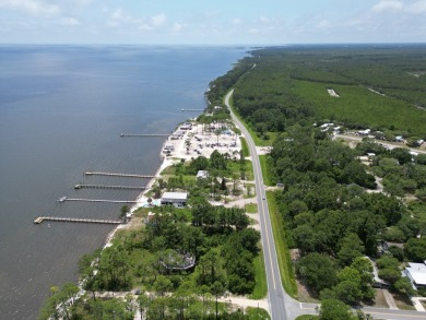 The bay front lot measures approximately 400 feet deep and on St. James Bay in Florida - for sale on GolfHomes.com, golf home, golf lot