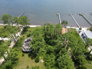 The bay front lot measures approximately 400 feet deep and on St. James Bay in Florida - for sale on GolfHomes.com, golf home, golf lot