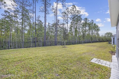 Not even one year old, this home has everything you could want on Cimarrone Golf and Country Club in Florida - for sale on GolfHomes.com, golf home, golf lot