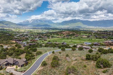 This exceptional lot sits on one of the premier streets in Red on Red Ledges Golf Club in Utah - for sale on GolfHomes.com, golf home, golf lot