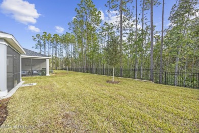 Not even one year old, this home has everything you could want on Cimarrone Golf and Country Club in Florida - for sale on GolfHomes.com, golf home, golf lot