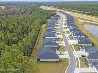 Not even one year old, this home has everything you could want on Cimarrone Golf and Country Club in Florida - for sale on GolfHomes.com, golf home, golf lot