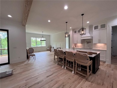 **Stunning New Construction with Owners Suite on Main & Outdoor on Traditions of Braselton Golf Club in Georgia - for sale on GolfHomes.com, golf home, golf lot