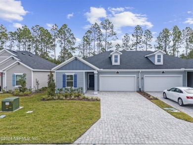 Not even one year old, this home has everything you could want on Cimarrone Golf and Country Club in Florida - for sale on GolfHomes.com, golf home, golf lot