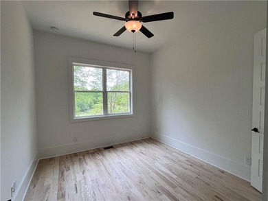 **Stunning New Construction with Owners Suite on Main & Outdoor on Traditions of Braselton Golf Club in Georgia - for sale on GolfHomes.com, golf home, golf lot