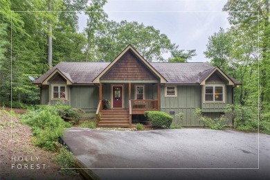 Enjoy an inviting three-bedroom, two-bathroom Arts and Crafts on Sapphire National Golf Club in North Carolina - for sale on GolfHomes.com, golf home, golf lot