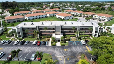 Beautifully renovated and FULLY FURNISHED  offered turn-key on Fountains Golf and Country Club in Florida - for sale on GolfHomes.com, golf home, golf lot