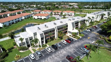 Beautifully renovated and FULLY FURNISHED  offered turn-key on Fountains Golf and Country Club in Florida - for sale on GolfHomes.com, golf home, golf lot