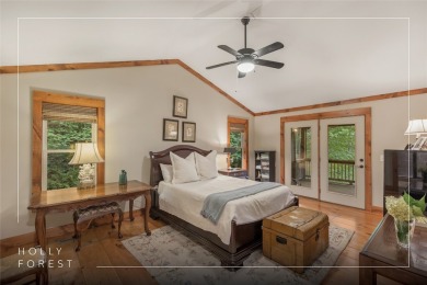 Enjoy an inviting three-bedroom, two-bathroom Arts and Crafts on Sapphire National Golf Club in North Carolina - for sale on GolfHomes.com, golf home, golf lot