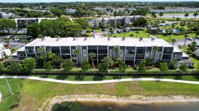 Beautifully renovated and FULLY FURNISHED  offered turn-key on Fountains Golf and Country Club in Florida - for sale on GolfHomes.com, golf home, golf lot