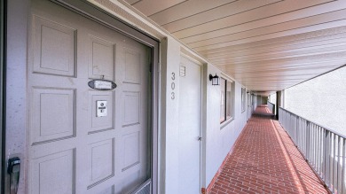 Beautifully renovated and FULLY FURNISHED  offered turn-key on Fountains Golf and Country Club in Florida - for sale on GolfHomes.com, golf home, golf lot