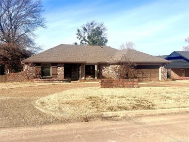 SIMPLY STUNNING!  THIS BEAUTY IS LOCATED DIRECTLY ACROSS FROM on McAlester Country Club in Oklahoma - for sale on GolfHomes.com, golf home, golf lot