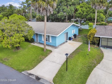 Welcome Home to this quiet and comfortable half duplex in the on New Smyrna Beach Golf Course in Florida - for sale on GolfHomes.com, golf home, golf lot