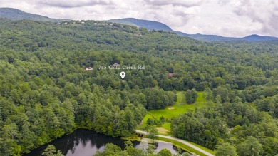 Discover the epitome of modern mountain living with this brand on Sapphire National Golf Club in North Carolina - for sale on GolfHomes.com, golf home, golf lot