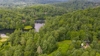 Discover the epitome of modern mountain living with this brand on Sapphire National Golf Club in North Carolina - for sale on GolfHomes.com, golf home, golf lot
