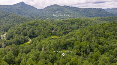 Discover the epitome of modern mountain living with this brand on Sapphire National Golf Club in North Carolina - for sale on GolfHomes.com, golf home, golf lot