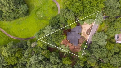 Discover the epitome of modern mountain living with this brand on Sapphire National Golf Club in North Carolina - for sale on GolfHomes.com, golf home, golf lot