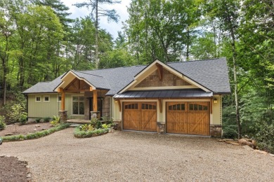 Discover the epitome of modern mountain living with this brand on Sapphire National Golf Club in North Carolina - for sale on GolfHomes.com, golf home, golf lot