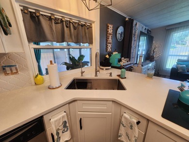 Rolling Greens Village is a friendly resort-style 55+ community on Rolling Greens Executive Golf Community in Florida - for sale on GolfHomes.com, golf home, golf lot