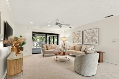 One or more photo(s) has been virtually staged. *Tudor Style*
 on Feather Sound Country Club in Florida - for sale on GolfHomes.com, golf home, golf lot