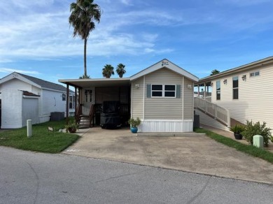 Experience coastal living at its finest with this charming on Long Island Golf Course in Texas - for sale on GolfHomes.com, golf home, golf lot