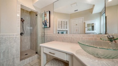 Gorgeously updated and hurricane-ready, this lakefront pool home on The Meadows Golf and Country Club in Florida - for sale on GolfHomes.com, golf home, golf lot