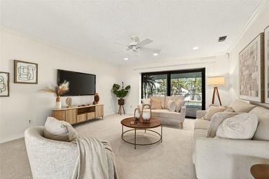 One or more photo(s) has been virtually staged. *Tudor Style*
 on Feather Sound Country Club in Florida - for sale on GolfHomes.com, golf home, golf lot